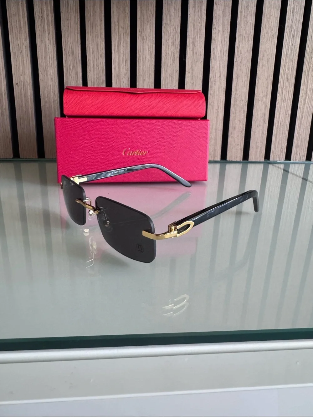 Cartier Black and Gold Rimless Sunglasses with Red Case